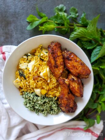 stir-fried egg biriyani with mint sambol and chicken wings